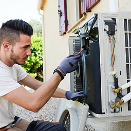 handsome-young-man-electrician-installing-air-conditioning-in-client-house-000071844637_small
